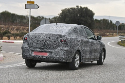 all-new-2021-dacia-logan-spied-with-led-lights-coupe-roof9.jpg