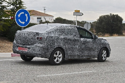 all-new-2021-dacia-logan-spied-with-led-lights-coupe-roof8.jpg
